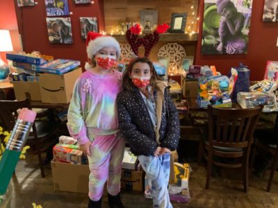 Three wise girls share the spirit of giving